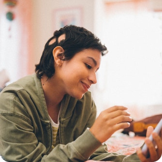 Adolescent girl with severe alopecia areata after hair regrowth on her phone